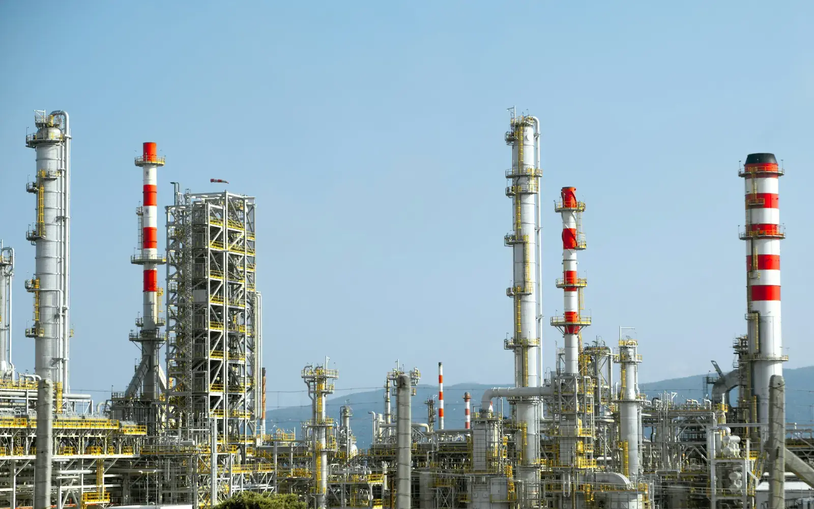 Refinery towers and pipework at an oil and gas processing facility